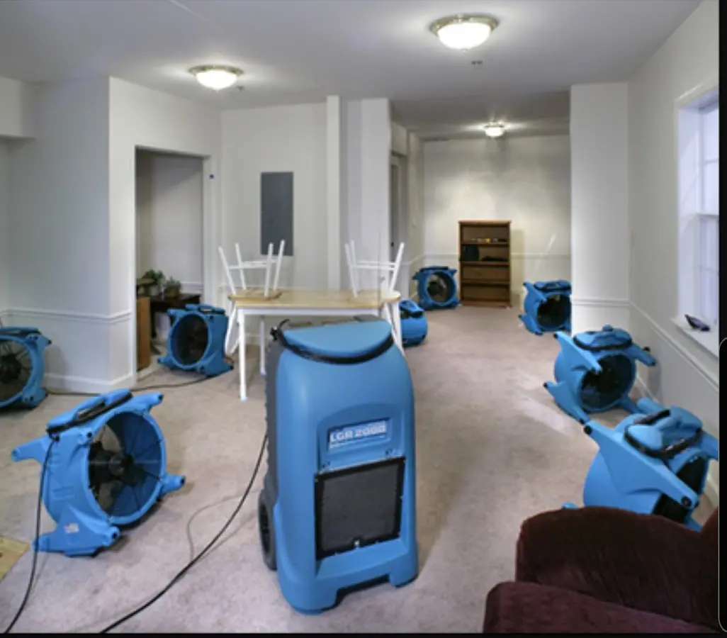 Air movers and dehumidifier setup for Water Damage Restoration in Balm